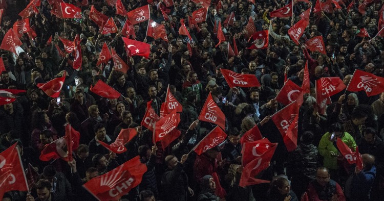 People wait outside of the Republican People's Party (CHP) Headquarters after voting ended for the local elections in Ankara, Turkey on April 01, 2019.