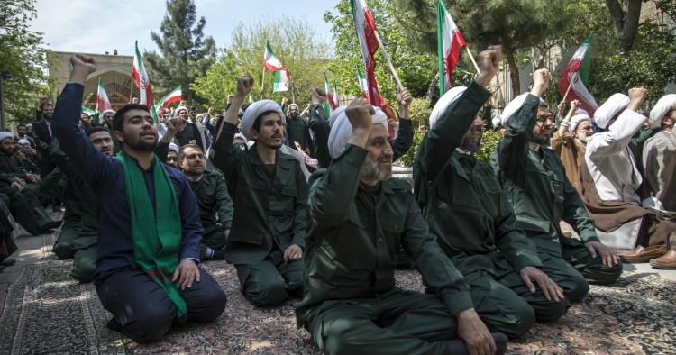 Iranian Clerics chant slogans during an anti-US rally in Tehran on April 14, 2019.