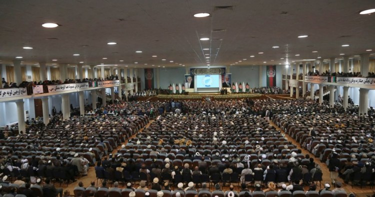 Afghan people attend the first day of the "loya jirga" (grand assembly) in Kabul, on April 29, 2019.