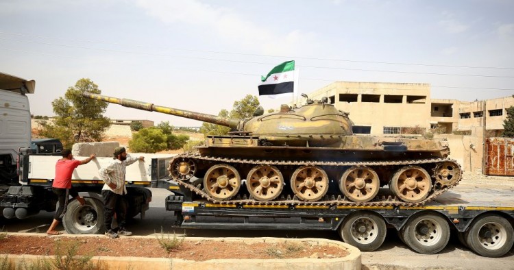 Heavy armoured vehicles of Syrian opposition forces are being withdrawn from Syria's Idlib to complete the establishment of the disarmament field due to the Sochi Agreement, agreed by Turkey and Russia, on October 08, 2018. (Photo by Gokhan Balci/Anadolu Agency/Getty Images)