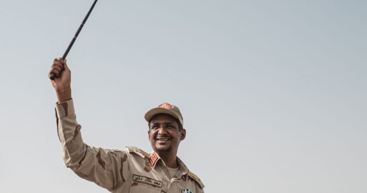 Mohamed Hamdan Dagalo, known as Himediti, deputy head of Sudan's ruling Transitional Military Council (TMC) and commander of the Rapid Support Forces (RSF) paramilitaries, waves a baton to supporters on a vehicle as he arrives for a rally in the village of Abraq, about 60 kilometers northwest of Khartoum, on June 22, 2019. (YASUYOSHI CHIBA/AFP/Getty Images)