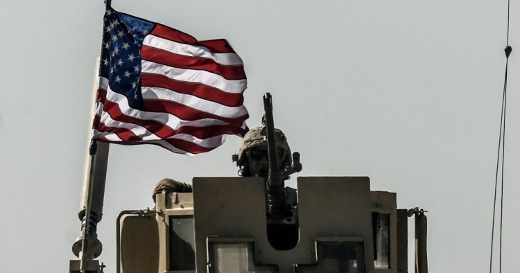 A US military convoy drives on a highway from Kobane to Ain Issa on September 29, 2017.