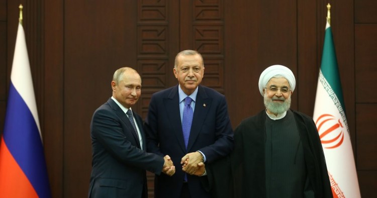  President of Turkey Recep Tayyip Erdogan (C), President of Russia Vladimir Putin (L) and President of Iran Hassan Rouhani (R) pose for a photo after the joint press conference held within the Turkey-Russia-Iran trilateral summit at Cankaya Mansion in Ankara, Turkey on September 16, 2019. 