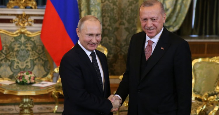  Russian President Vladimir Putin (L) greets Turkish President Recep Tayyip Erdogan (R) during their bilateral talks at the Grand Kremlin Palace on April 8, 2019 in Moscow, Russia.