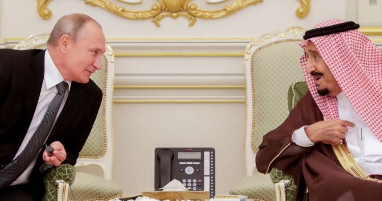 Russia's President Vladimir Putin (L) and King Salman bin Abdulaziz Al Saud of Saudi Arabia at a ceremony to sign joint documents following Russian-Saudi talks at the Al-Yamamah Royal Palace. 