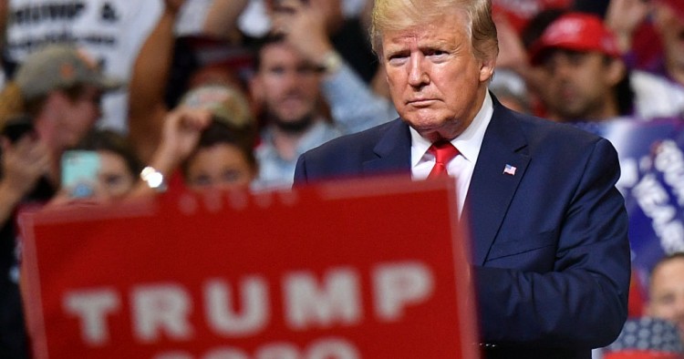 US President Donald Trump looks on during a rally at the Amway Center in Orlando, Florida to officially launch his 2020 campaign on June 18, 2019.