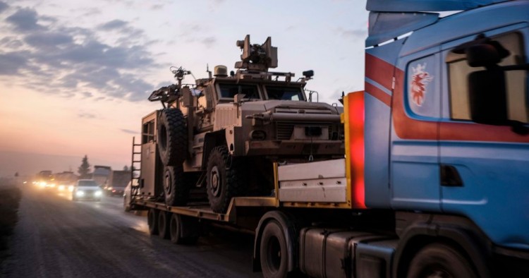 A convoy of U.S. armored military vehicles leave Syria on a road to Iraq on October 19, 2019 in Sheikhan, Iraq.