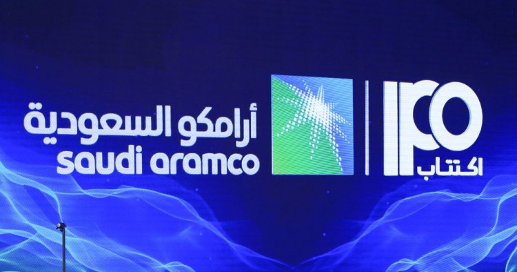 A picture taken on November 3, 2019 shows a sign of Saudi Aramco's initial public offering (IPO) during a press conference by the state company in the eastern Saudi Arabian region of Dhahran.