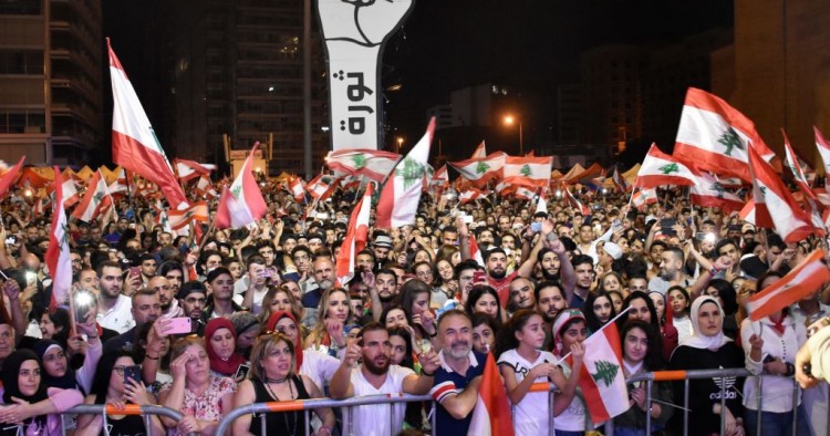 People gather stage an anti government protest in Beirut, Lebanon on November 10, 2019. 