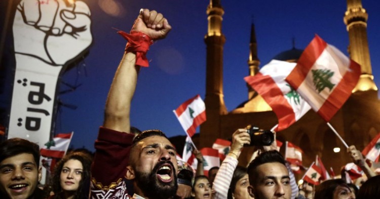 Anti-government activists take part in a protest in downtown Beirut, demonstrations across Lebanon entered its 2nd months.