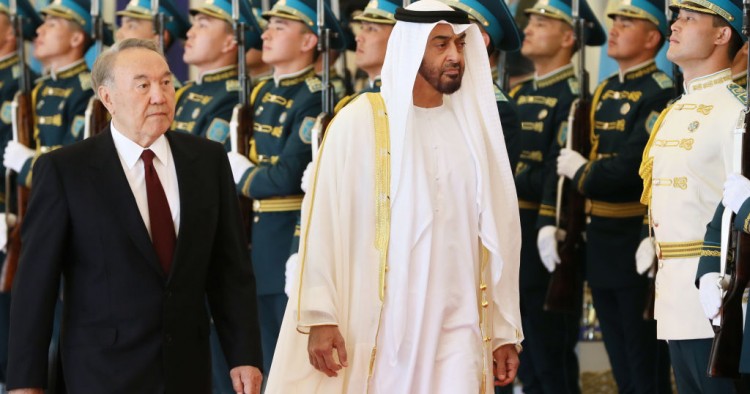 Abu Dhabi Crown Prince Mohammed bin Zayed al-Nahayan (R) reviews an honour guard with Kazakhstan's President Nursultan Nazarbayev during a welcoming ceremony in Astana on July 4, 2018.