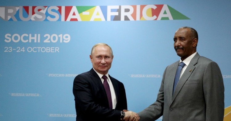 Russias President Vladimir Putin and the Chairman of the Sovereignty Council of Sudan, Abdel Fattah al-Burhan shake hands during a meeting on sidelines of the 2019 Russia-Africa Economic Forum at the Sirius Park of Science and Art.