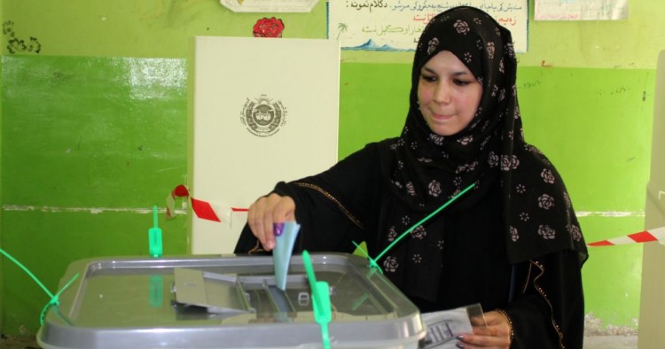 Afghan woman casts his vote at a polling station during the presidential elections in Kabul, Afghanistan on September 28, 2019. 