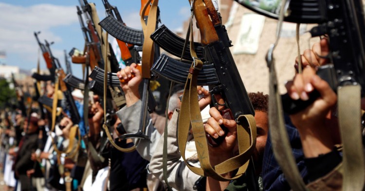 Houthi followers hold their guns during a tribal gathering against the continued war and blockade on October 03, 2019 in Sana'a, Yemen.