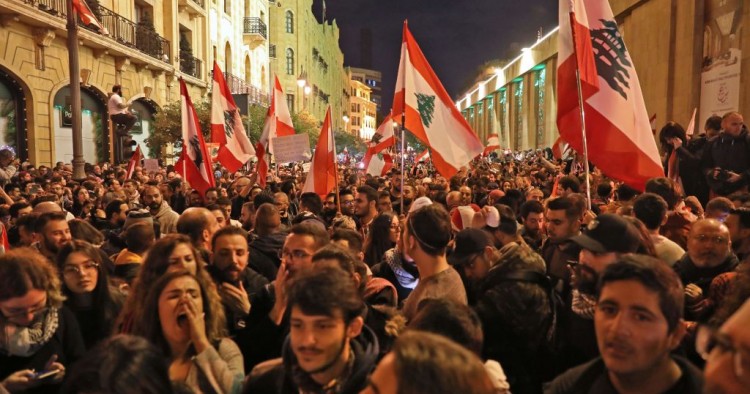  Lebanese demonstrators south slogans in the capital Beirut on December 15, 2019.