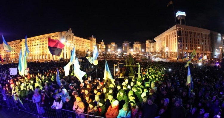 People attend a rally marking the 6th anniversary of the 2014 Euromaidan antigovernment riots at Kiev's Independence Square.