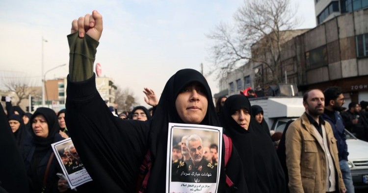 People gather to stage a protest against the killing of Iranian Revolutionary Guards' Quds Force commander Qasem Soleimani by a US air strike in the Iraqi capital Baghdad, after Friday prayer in Tehran, Iran on January 3, 2020. 