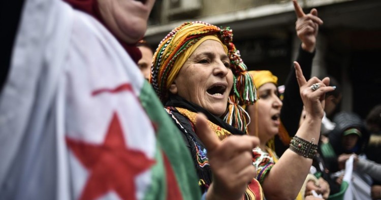 Algerians chant slogans as they take part in an anti-government demonstration in the center of the capital Algiers on January 10, 2020. 