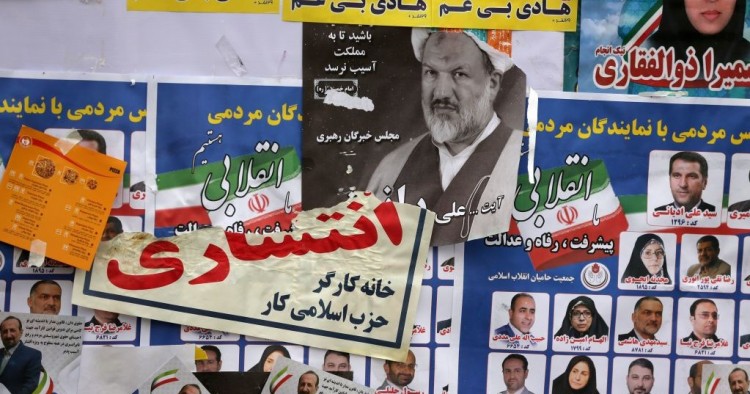 Iranian electoral posters and fliers are pictured on the last day of election campaign in Tehran on February 19, 2020.