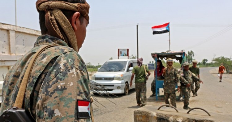 Fighters with the UAE-trained Security Belt Forces loyal to the pro-independence Southern Transitional Council (STC) man a checkpoint near the south-central coastal city of Zinjibar in south-central Yemen, in the Abyan Governorate, on August 21, 2019. 