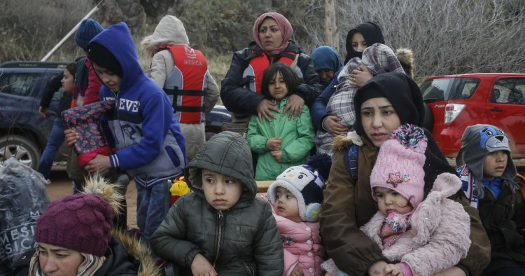  Irregular migrants escaped from civil war in Syria, who want to proceed to Europe, are seen after they came with a boat at a shore in Lesbos Island on Greece on February 28, 2020.