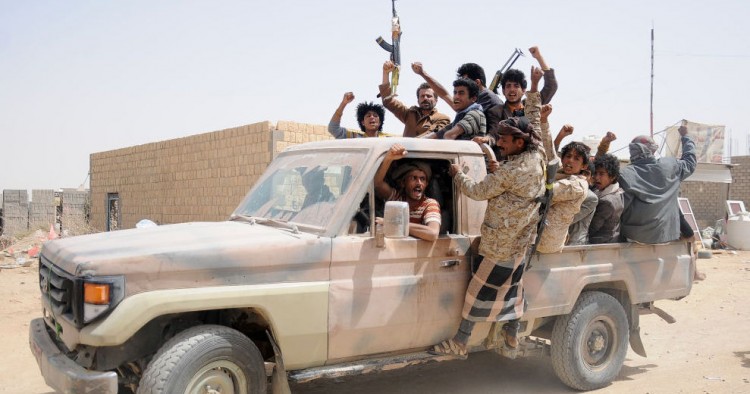 Houthi fighters gather on a vehicle in a recently captured area following heavy fighting with forces loyal to the internationally recognized government on March 2, 2020 in Al-Jawf province, Yemen. 