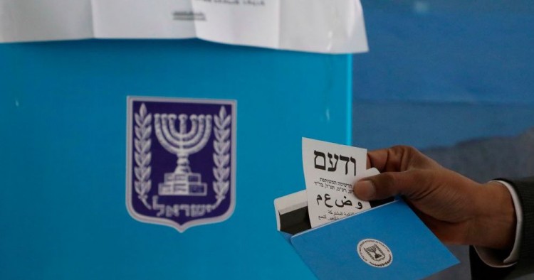 Arab Israeli MP and Arab Joint List candidate Said al-Harumi votes in the Bedouin town of Segev Shalom or Shaqib al-Salam near the southern Israeli city of Beersheva on March 2, 2020. 