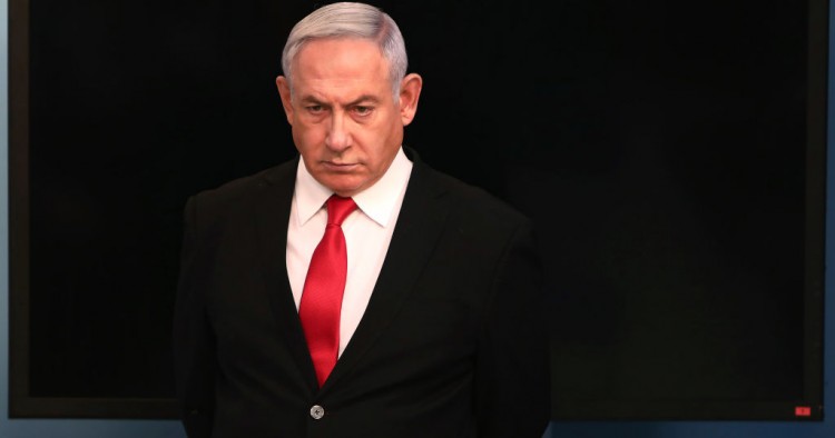 Israeli Prime Minister Benjamin Netanyahu arrives for a speech at his Jerusalem office on March 14, 2020, regarding the new measures that will be taken to fight the Corona virus in Israel.