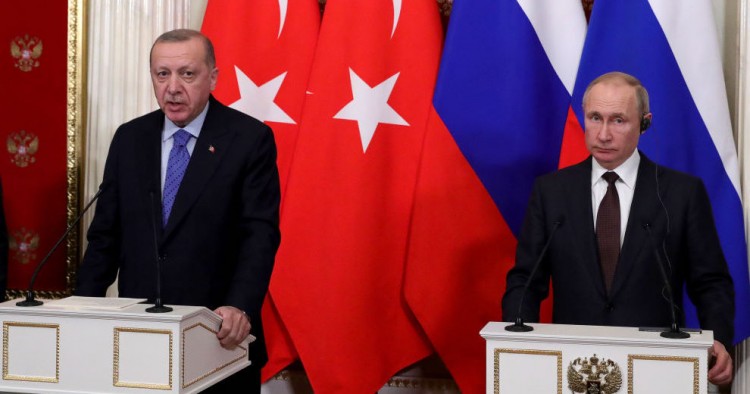 Turkey's President Recep Tayyip Erdogan (L) and Russia's President Vladimir Putin at a press conference following their meeting at the Moscow Kremlin.