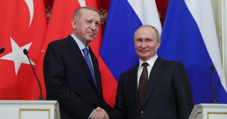 President of Turkey Recep Tayyip Erdogan (L) and President of Russia Vladimir Putin (R) shake hands at the end of a joint news conference following an inter-delegation meeting at Kremlin Palace in Moscow, Russia on March 5, 2020.