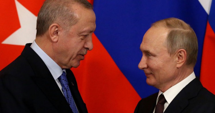 Russian President Vladimir Putin and Turkish President Recep Tayyip Erdogan greet each other during their talks at the Kremlin on March 5, 2020 in Moscow, Russia. Erdogan is having a one day visit to Russia to discuss the war conflcit in Syria. 
