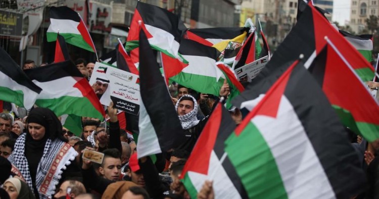 Thousands of protesters gather at Al-Manara Square to protest against U.S. President Donald Trump's Middle East plan, in Ramallah, West Bank on February 11, 2020.