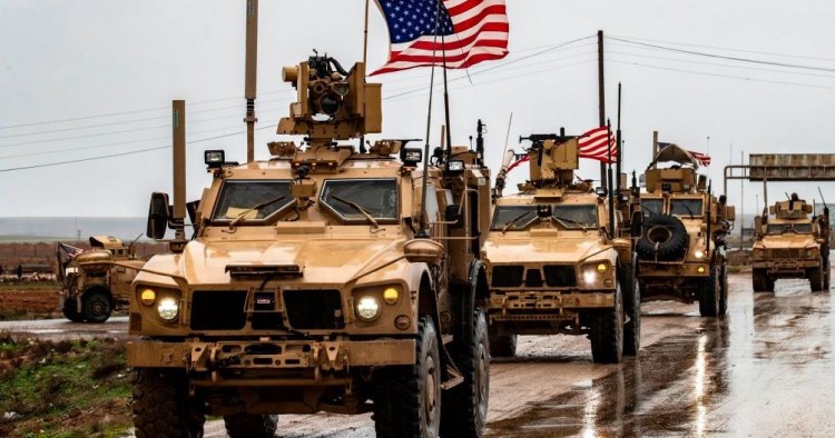 American soldiers patrol on the M4 highway in the town of Tal Tamr in the northeastern Syrian Hasakeh province on the border with Turkey on January 24, 2020. 