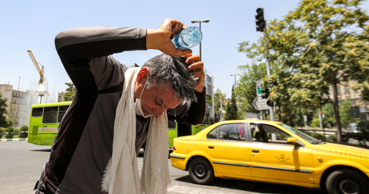 Photo by ATTA KENARE/AFP via Getty Images