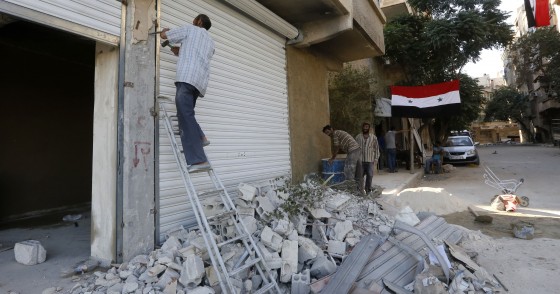 Syrians rebuild their homes in the town of Harasta