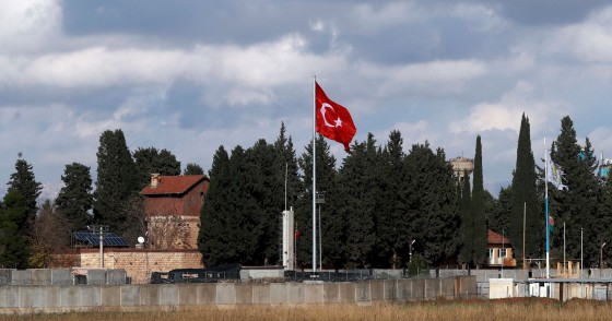 Turkish flag hangs at border with Syria