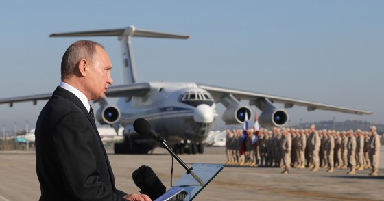 LATAKIA, SYRIA DECEMBER 11, 2017: Russia's President Vladimir Putin addresses Russian forces at the Russian Hmeimim air base. Putin has ordered Russian troops to start pulling out of Syria. Mikhail Klimentyev/Russian Presidential Press and Information Office/TASS (Photo by Mikhail Klimentyev\TASS via Getty Images)