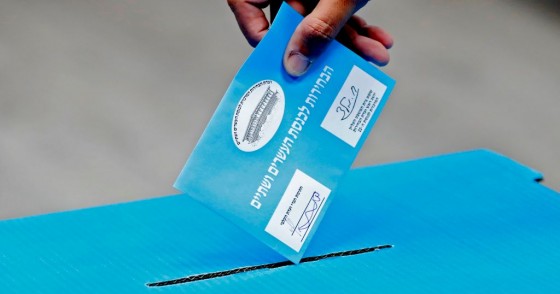 An Israeli man casts his ballot during Israel's parliamentary election, at a polling station in Rosh Haayin, on September 17, 2019.