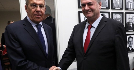 Russia's Foreign Minister Sergei Lavrov (L) and Israel's Foreign Minister Yisrael Katz shake hands during a meeting on the sidelines of the 74th session of the UN General Assembly at the headquarters of the United Nations in Manhattan.