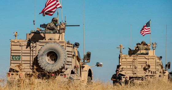 A convoy of US military vehicles drives near the town of Tal Tamr in the northeastern Syrian Hasakeh province on the border with Turkey, on November 10, 2019.