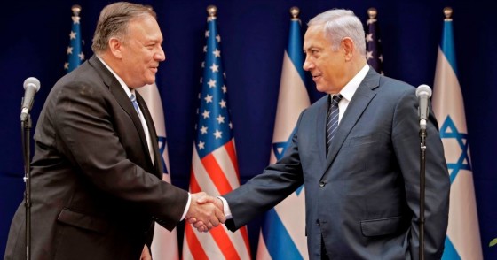 Israeli Prime Minister Benjamin Netanyahu (R) shakes the hand of US Secretary of State Mike Pompeo following their meeting in Jerusalem on October 18, 2019.