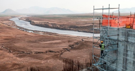 A worker goes down a construction ladder at the Grand Ethiopian Renaissance Dam (GERD), near Guba in Ethiopia, on December 26, 2019.