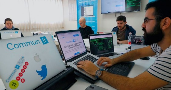 Engineers from the Israeli company "Commun.it" use their expertise in social media commercial analysis to identify networks of fake users, at their offices in the Israeli city of Bnei Brak near Tel Aviv on January 23, 2019.
