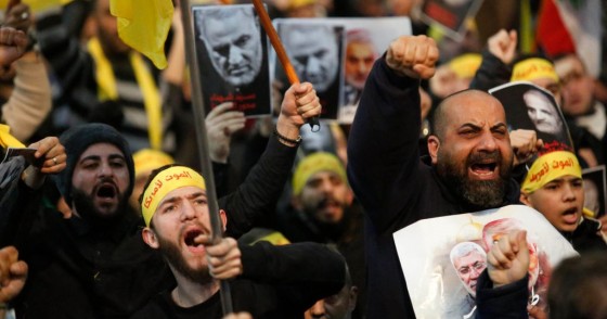 Supporters shout slogans during a rally for Qassem Soleimani in southern suburbs of Beirut, Lebanon, on Jan. 5, 2020. Hezbollah leader Sayyed Hassan Nasrallah urged on Sunday its fighters to attack U.S. soldiers in the region in retaliation for the assassination of Iranian top commander Qassem Soleimani by the United States. (Photo by Bilal Jawich/Xinhua via Getty) (Xinhua/ via Getty Images)