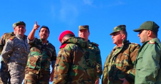 Maj. Gen. Khader (center) tours regime positions near Shoula alongside Feras Jeham (pointing) commander of the Deir ez-Zor NDF and Republican Guard officers.