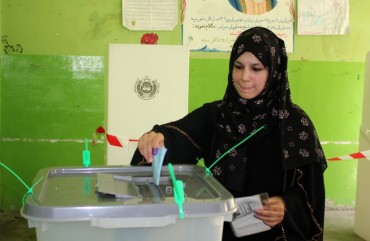 Afghan woman casts his vote at a polling station during the presidential elections in Kabul, Afghanistan on September 28, 2019.
