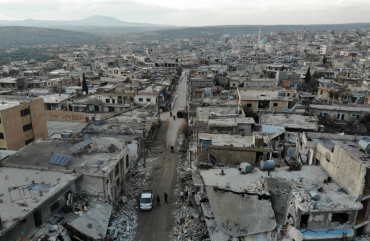 An aerial view taken on December 8, 2019 shows the damage caused by reported Syrian regime and Russian air strikes the previous day in the town of Al-Bara in the south of Syria's Idlib province, that killed at least four civilans, including a child and wounding several others. 