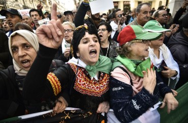 Algerian protesters take part in an anti-government demonstration in the capital Algiers on January 3, 2020. 