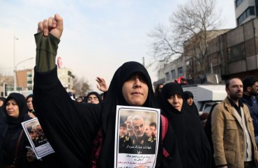 People gather to stage a protest against the killing of Iranian Revolutionary Guards' Quds Force commander Qasem Soleimani by a US air strike in the Iraqi capital Baghdad, after Friday prayer in Tehran, Iran on January 3, 2020.