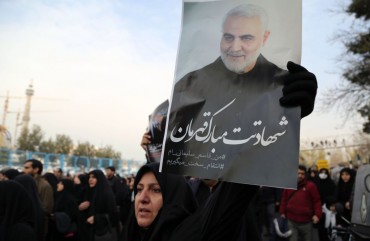 People gather to stage a protest against the killing of Iranian Revolutionary Guards' Quds Force commander Qasem Soleimani by a US air strike in the Iraqi capital Baghdad, after Friday prayer in Tehran, Iran on January 3, 2020. 